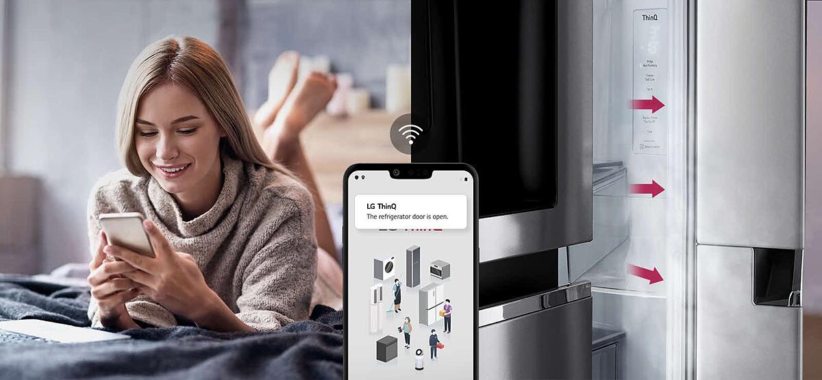 A woman lounges on a bed looking at her phone screen on one image. The second image shows that the refrigerator door has been left open. In the foreground of the two images is the phone screen which s