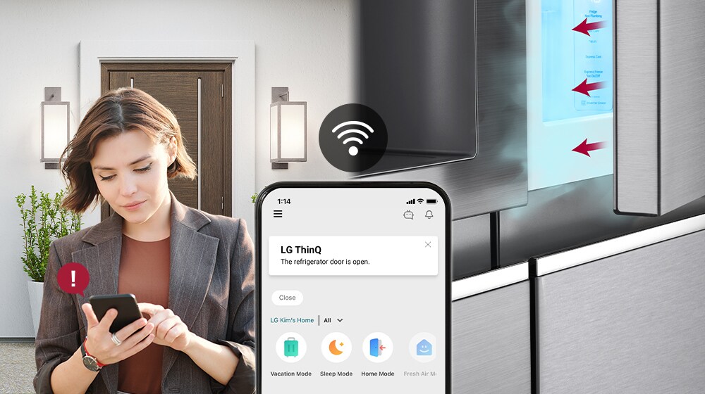 A woman receives an alert on her smartphone from the LG ThinQ app about an open refrigerator door.