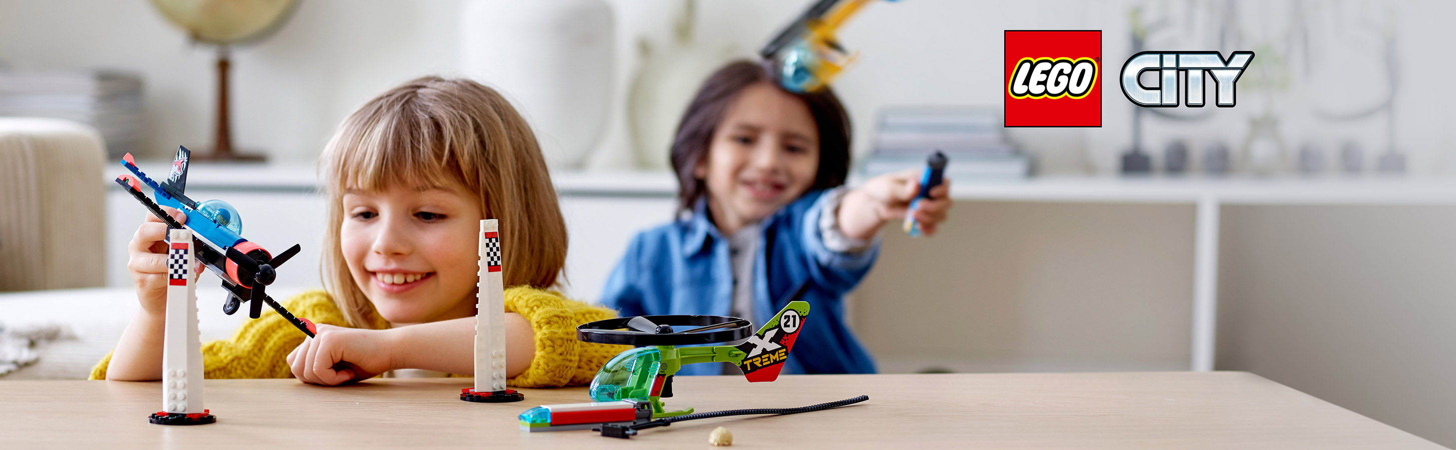 Kids compete with flying LEGO® helicopters