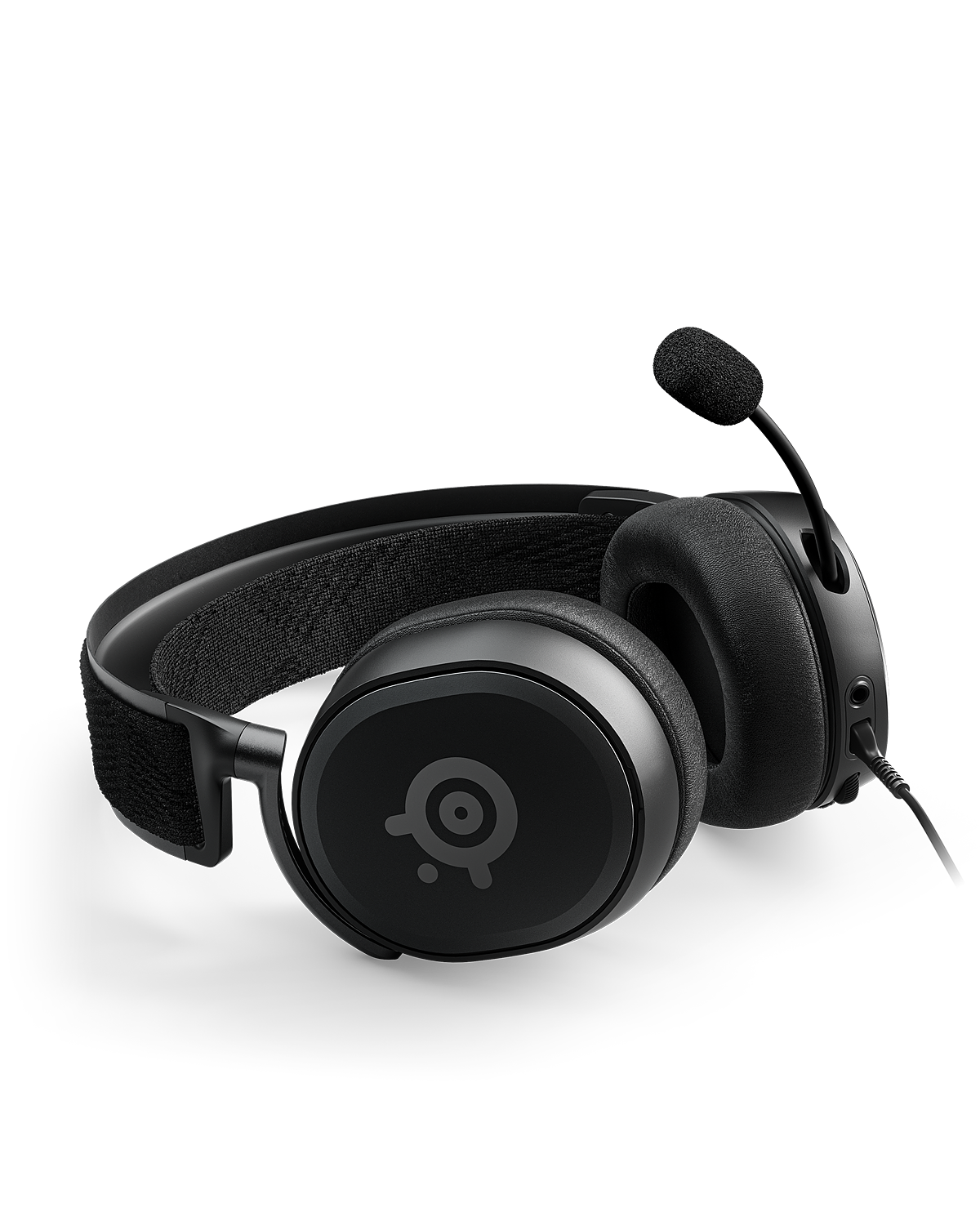 An Arctis Prime lays on its side with the mic fully extended.