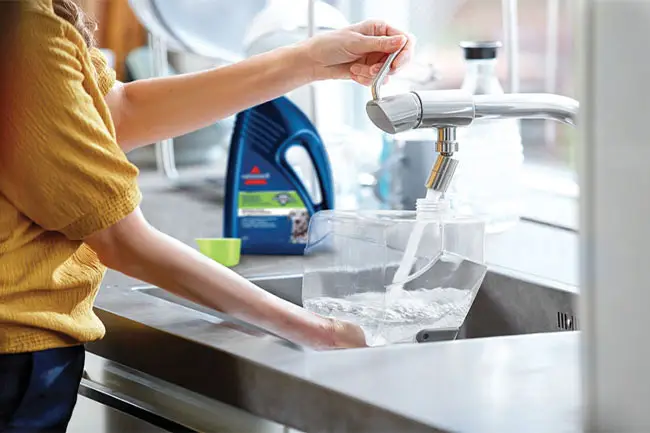 Système à double réservoirs